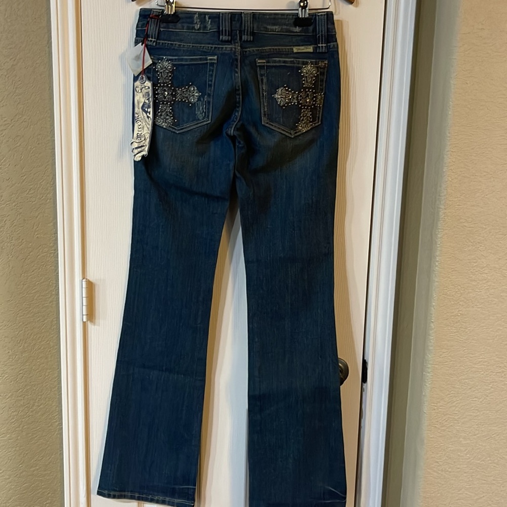 Women’s miss me jeans with Cross on pocket size 29